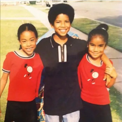 Childhood picture of Miyagi Hasani Ayo Chilombo With His Sisters.